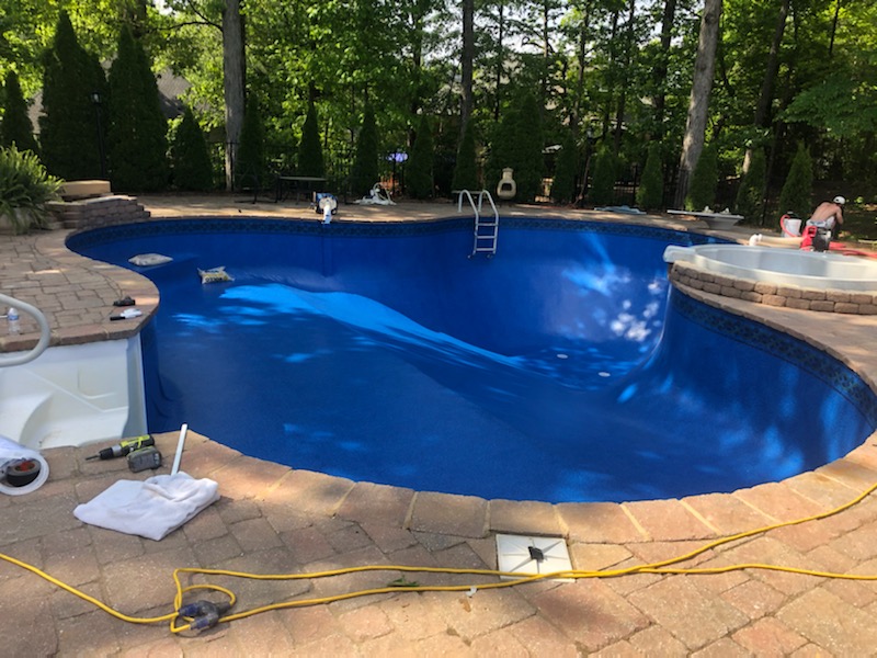 Pool liner installation in progress &mdash; Whitman residence Auburn AL